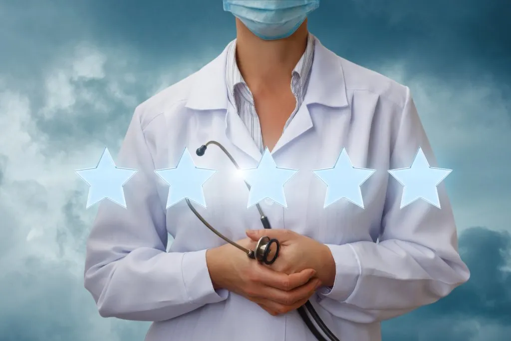Doctor with five-star healthcare rating and patient satisfaction concept
