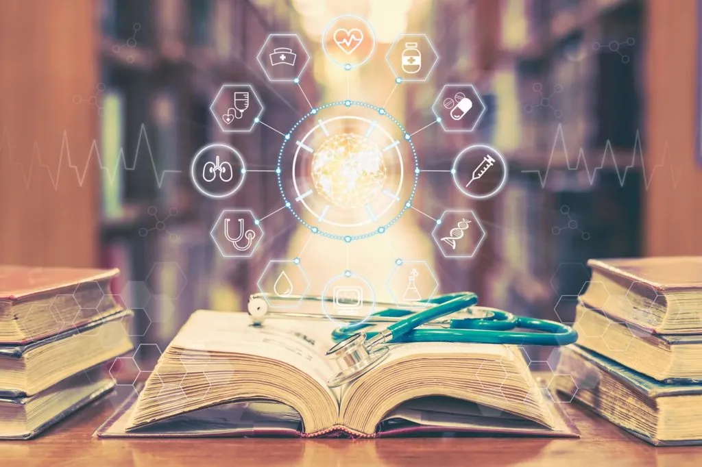 Medical education concept with healthcare icons, stethoscope, and open books in library