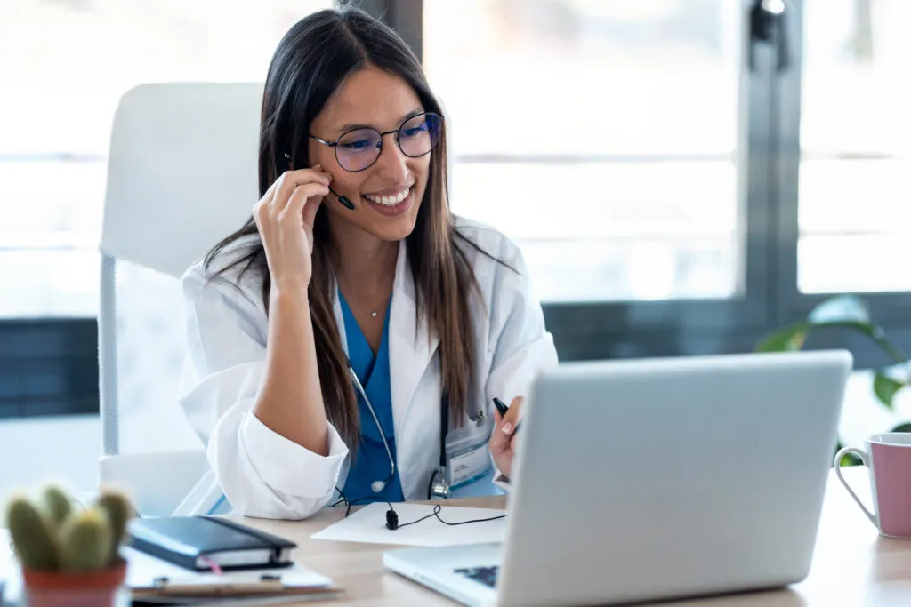 Female doctor wearing headset during virtual healthcare consultation