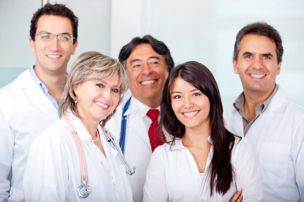 Healthcare professionals posing together for chronic care management services